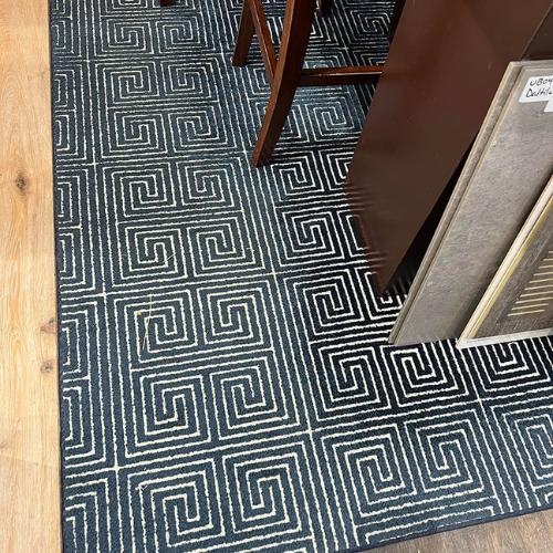 carpet under wood table and chairs